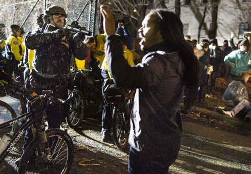 Keith Ellison's son & Minneapolis cop ready to shoot, Nov 2015.png