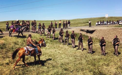 DAPL protest horses cops tumblr_occshtglTe1r3e226_og_1280[1].jpg