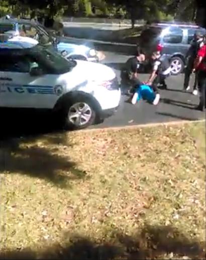 Keith Scott image from Wife Video moments after shoting.jpg