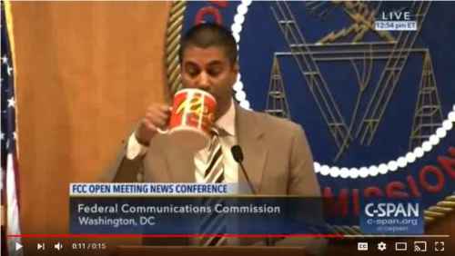 Ajit Pai drinks from mug. (C-SPAN via Sentry at YouTube)