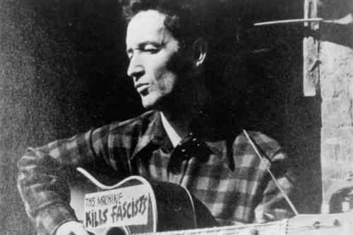 Woody-Guthrie-Kills-Fascists_1.jpg